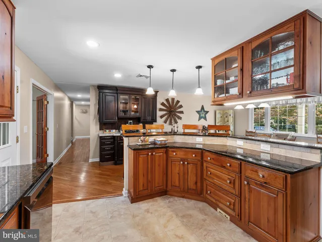 a kitchen with lots of counter space and a sink