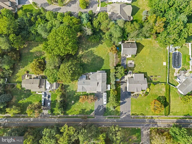 an aerial view of residential house with outdoor space