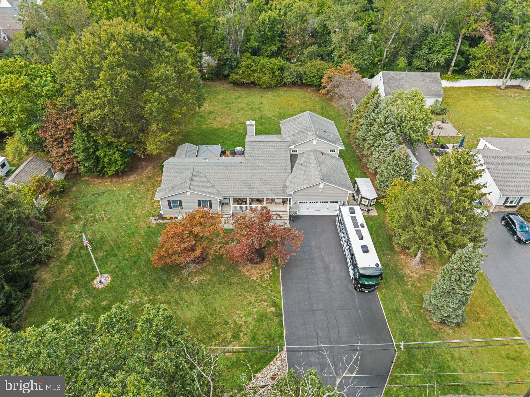 264 Edgebrook Road Robbinsville, NJ 08691 - Photo 4 of 39 an aerial view of a house with swimming pool and garden view