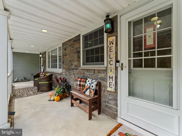 a backyard of a house with seating space