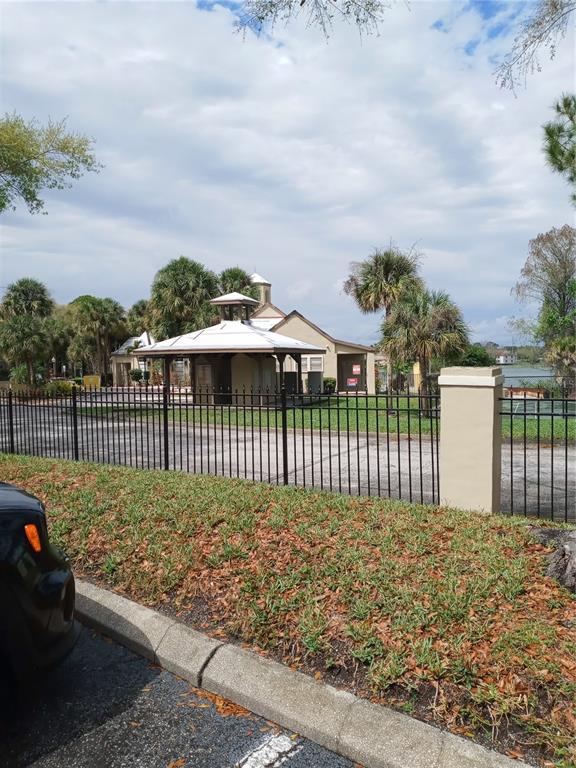 216 Afton Square, Unit 208 Altamonte Springs, FL 32714 - Photo 17 of 19 a front view of a house having yard