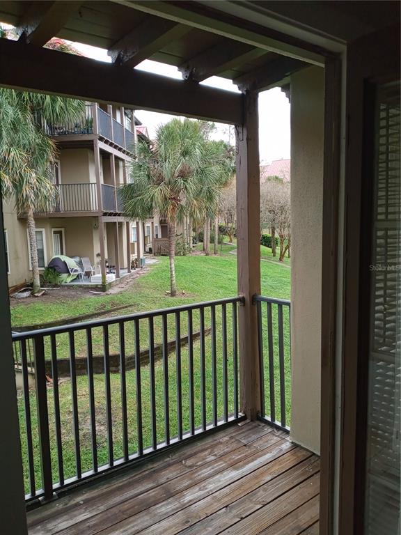 216 Afton Square, Unit 208 Altamonte Springs, FL 32714 - Photo 19 of 19 a view of balcony with wooden floor