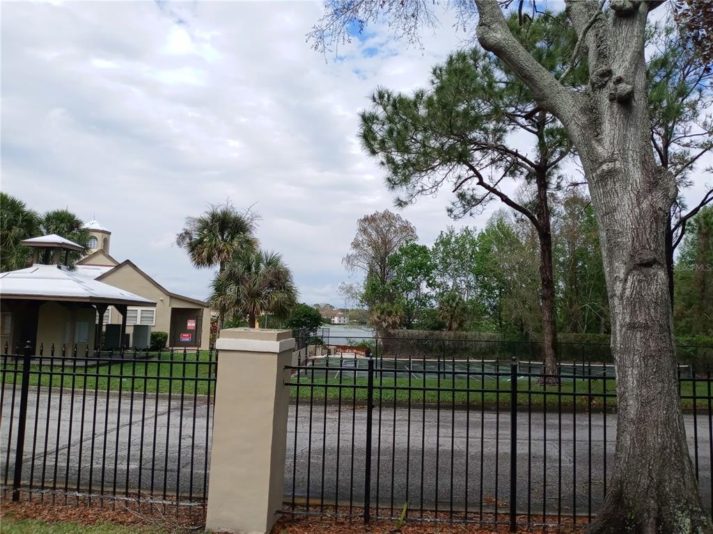 216 Afton Square, Unit 208 Altamonte Springs, FL 32714 - Photo 3 of 19 a view of a wrought iron fences in front of house