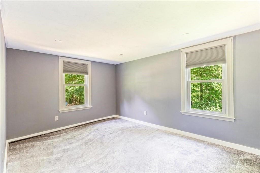 165 Summer Street Scituate, MA 02066 - Photo 15 of 22 an empty room with windows