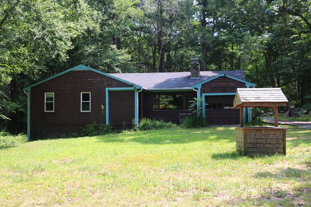 165 Summer Street Scituate, MA 02066 - Photo 21 of 22 a front view of a house with garden