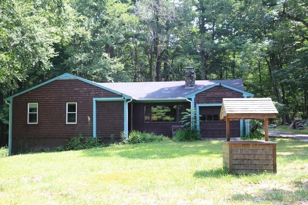 165 Summer Street Scituate, MA 02066 - Photo 5 of 22 a front view of a house with garden