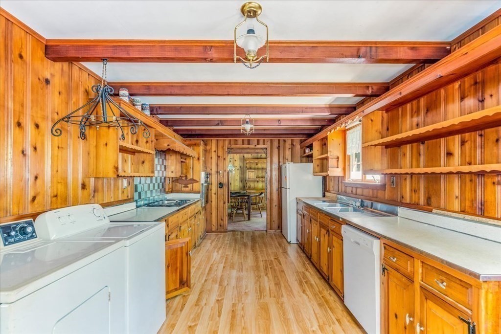 165 Summer Street Scituate, MA 02066 - Photo 8 of 22 a view of a kitchen with a sink and wooden floor