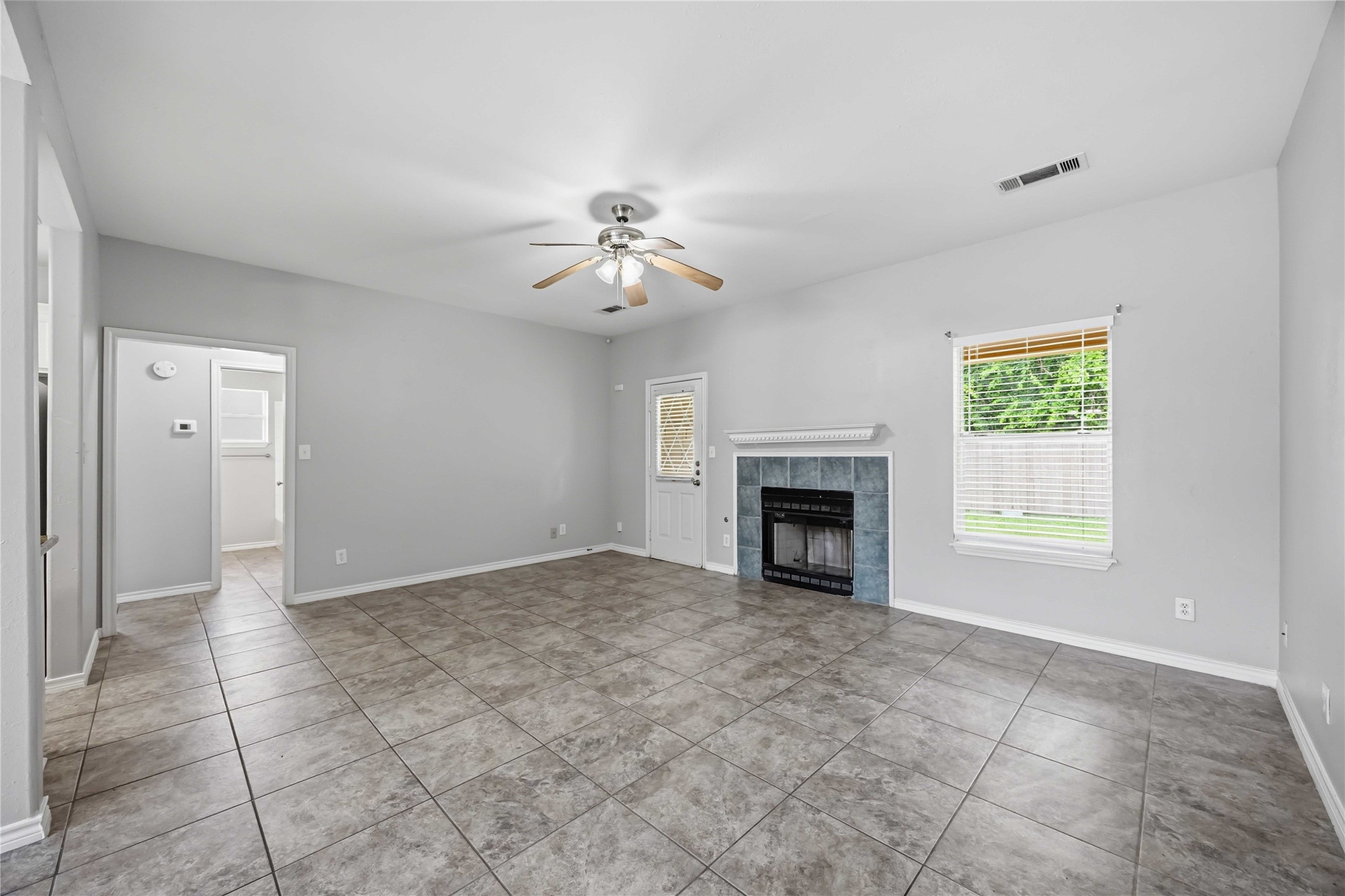 23619 Summer Pine Drive Spring, TX 77373 - Photo 3 of 25 Living room with gas fireplace