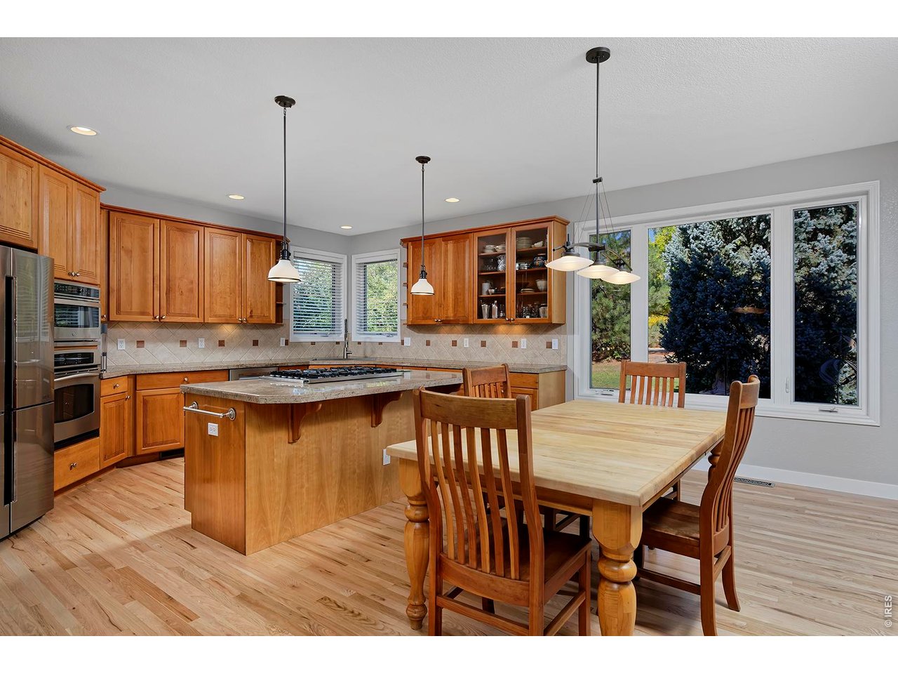 1260 Hawk Ridge Road Lafayette, CO 80026 - Photo 11 of 48 Beautiful Cherry cabinets