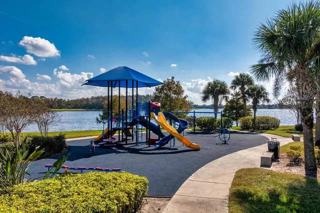 a view of a lake with a slide