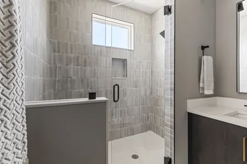 a view of an empty room with a window