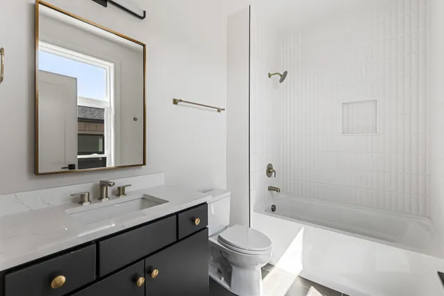 a patio with water view and city view