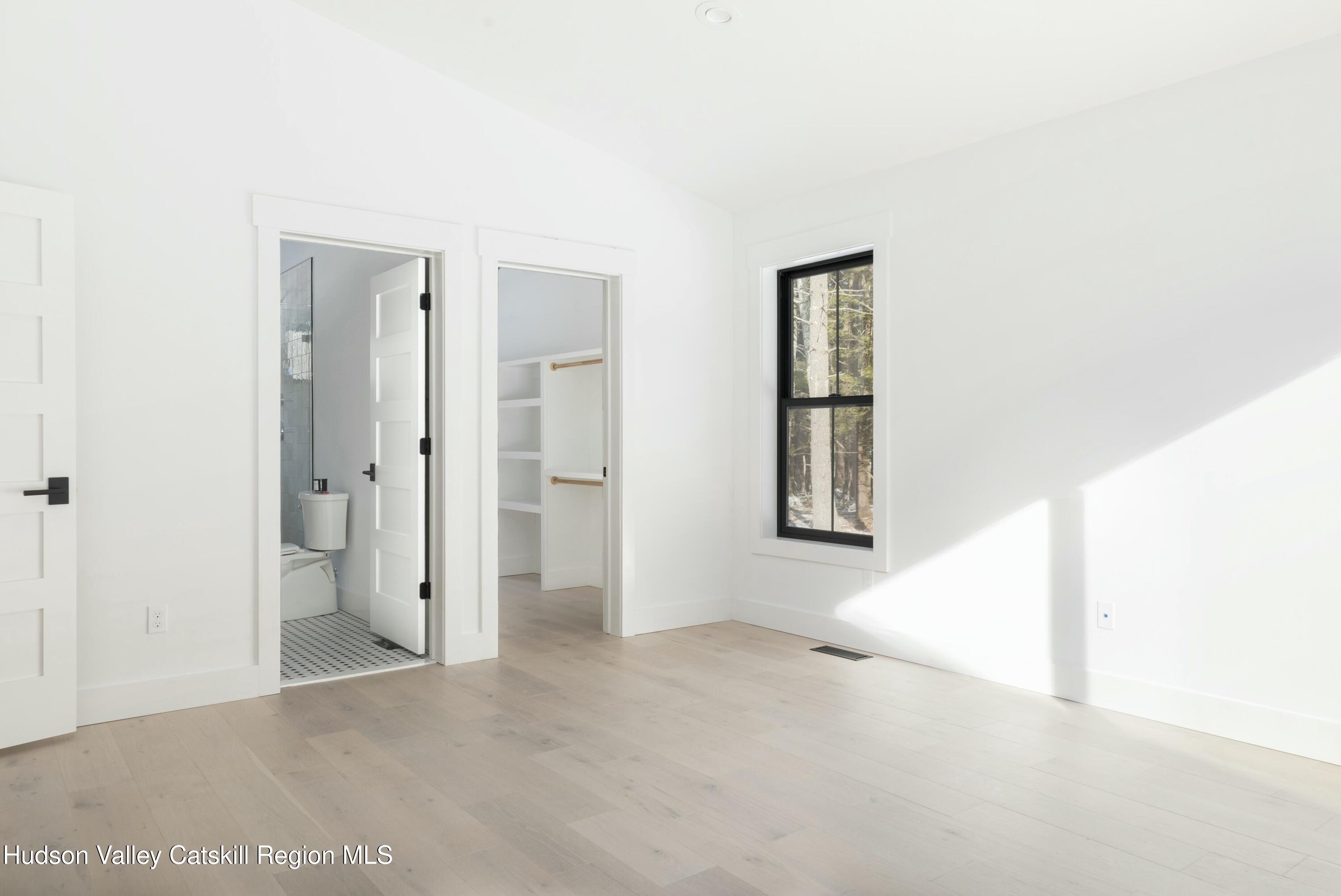 34 Tetta Lane Olivebridge, NY 12461 - Photo 16 of 35 a view of an empty room with closet and a window