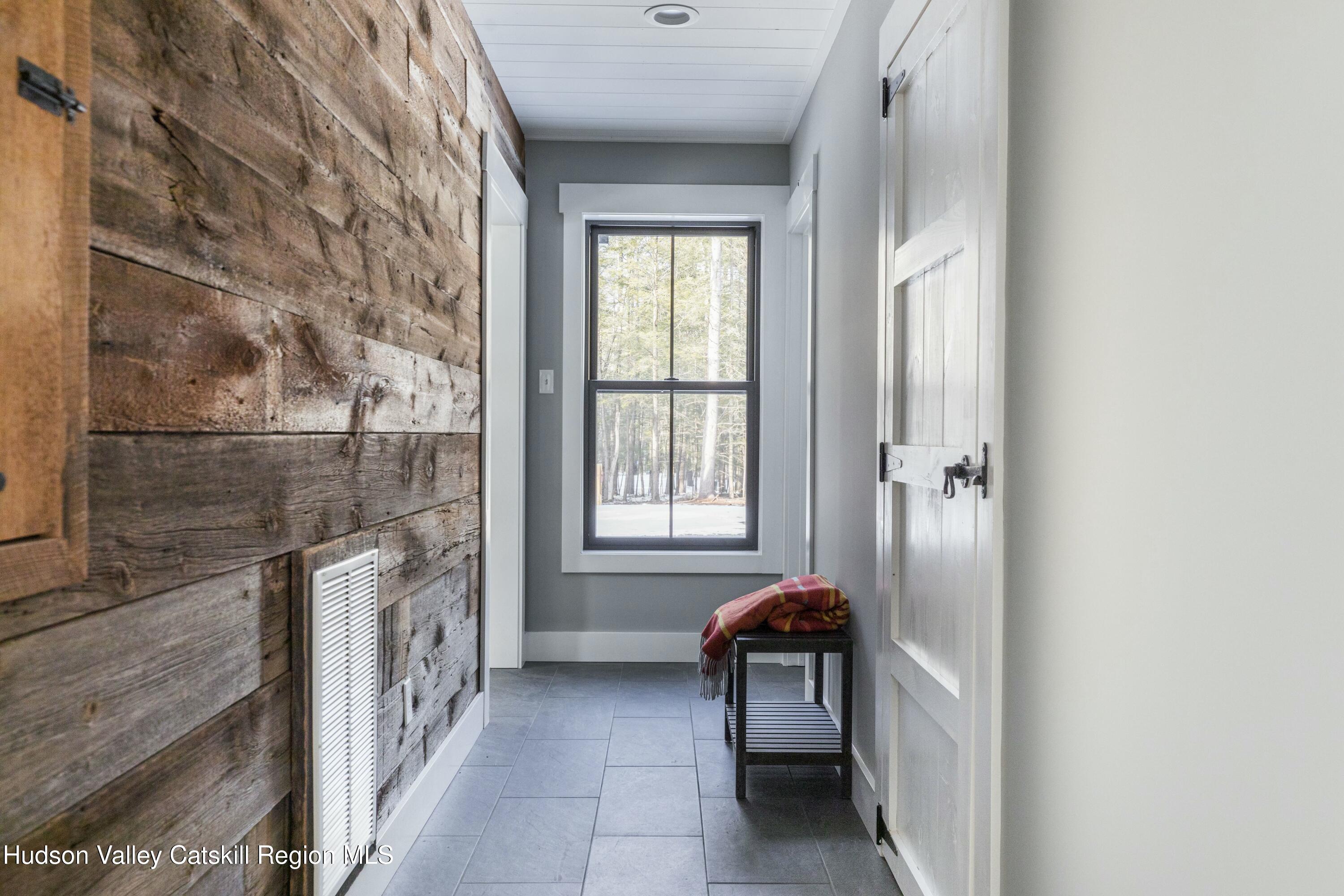34 Tetta Lane Olivebridge, NY 12461 - Photo 19 of 35 a view of a bedroom with a bed and a window