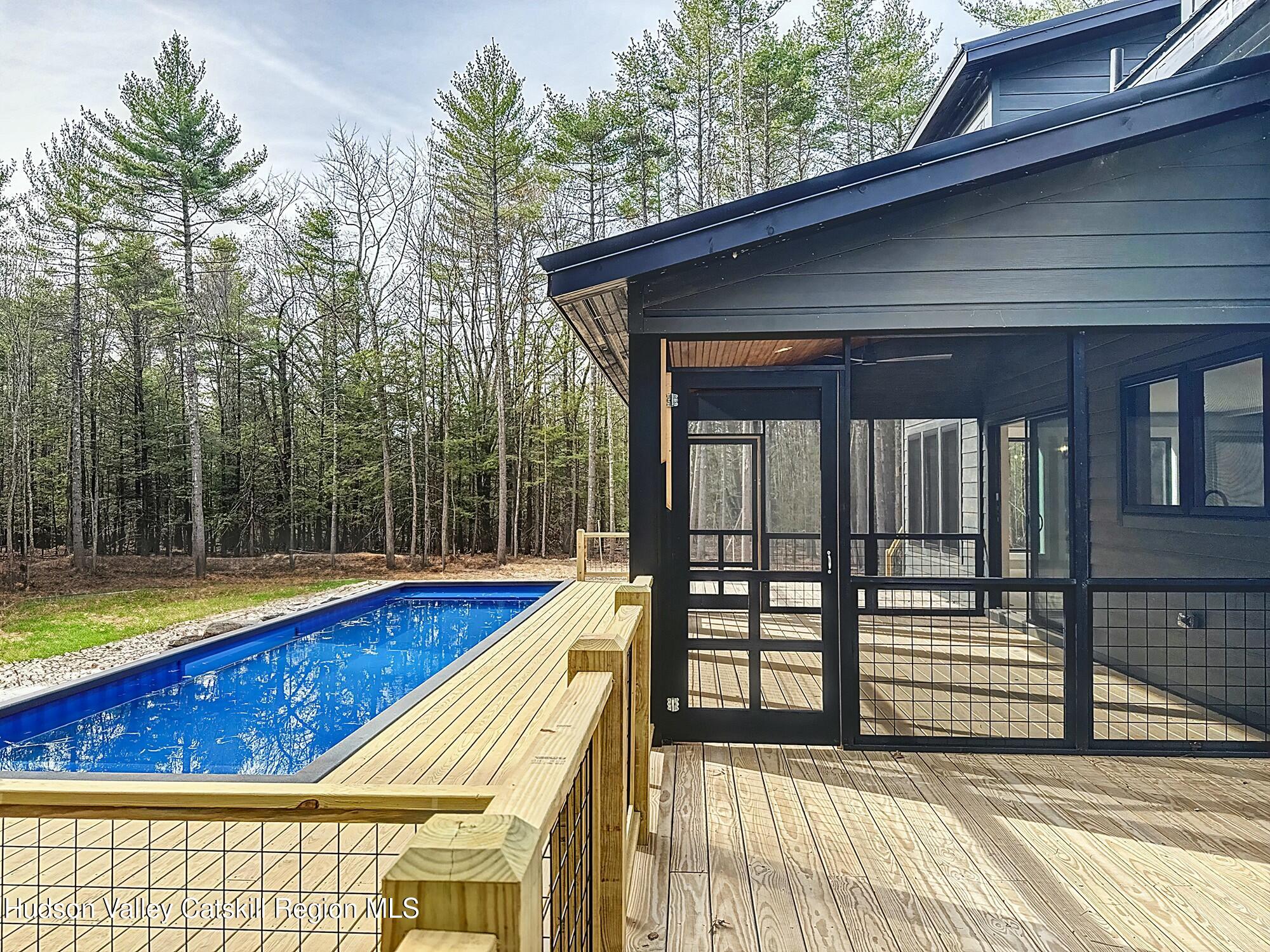 34 Tetta Lane Olivebridge, NY 12461 - Photo 3 of 35 a view of swimming pool with seating area