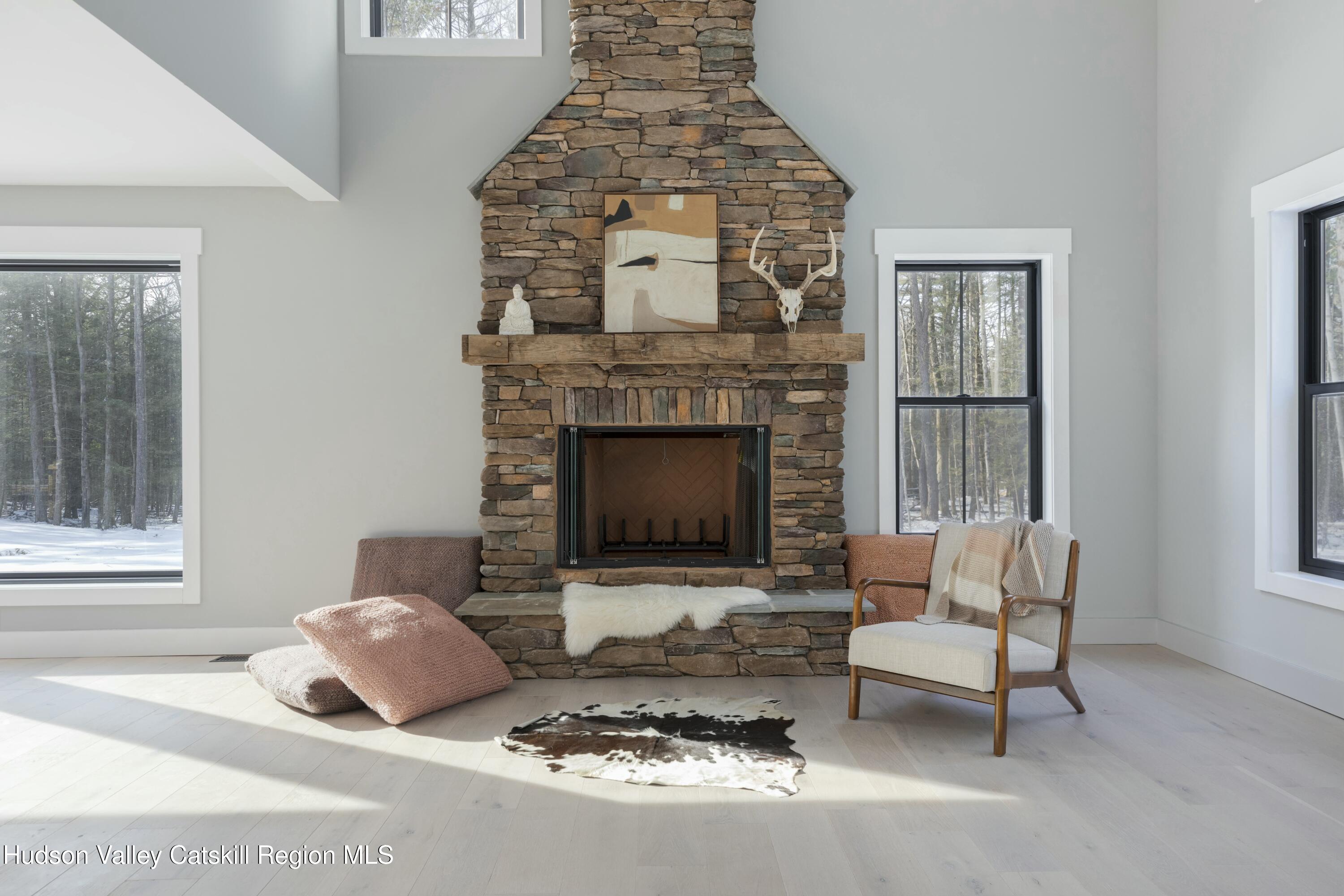 34 Tetta Lane Olivebridge, NY 12461 - Photo 5 of 35 a living room with furniture and a fireplace