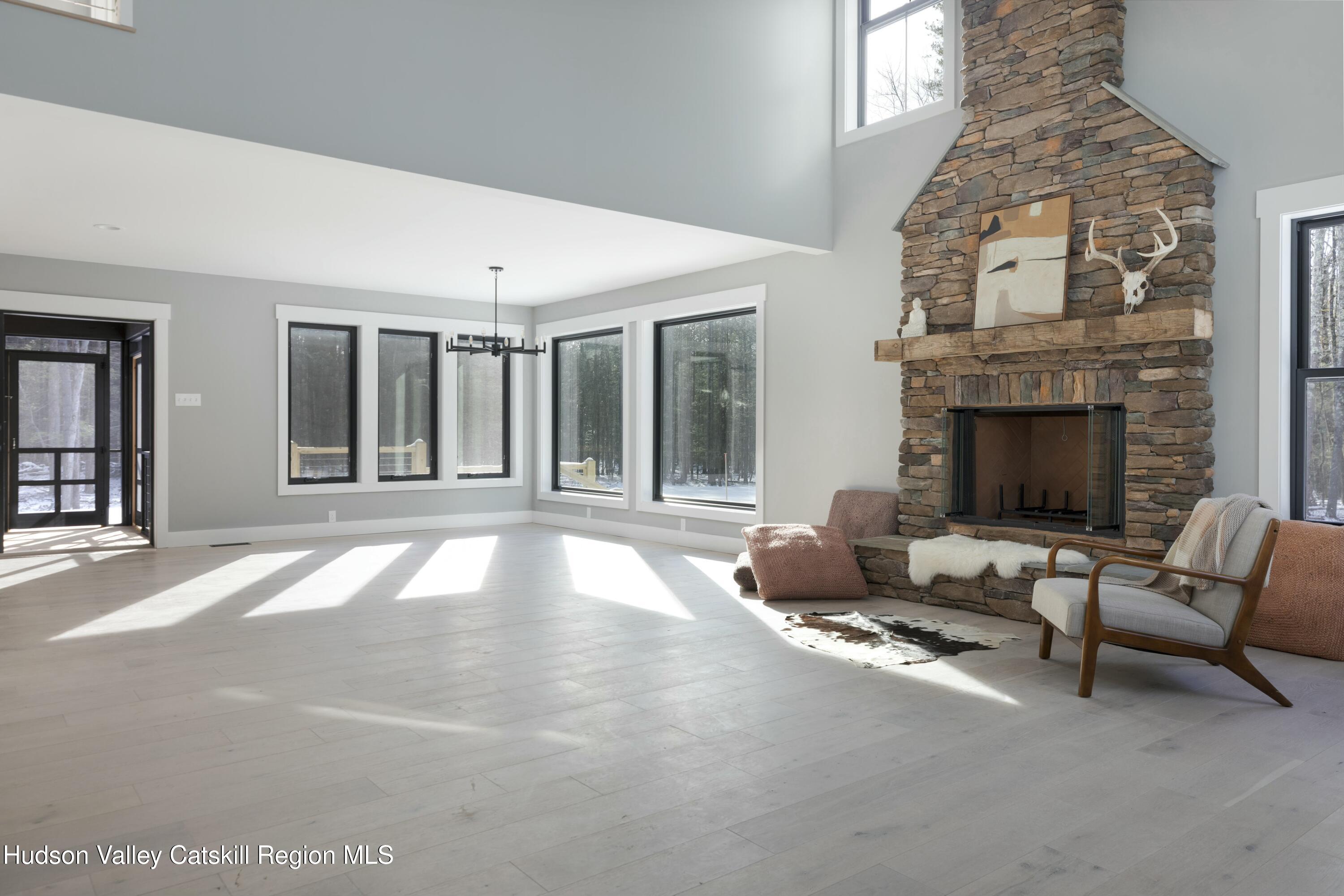 34 Tetta Lane Olivebridge, NY 12461 - Photo 10 of 35 a living room with furniture and a fireplace