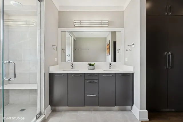 a spacious bedroom with a bed and a window