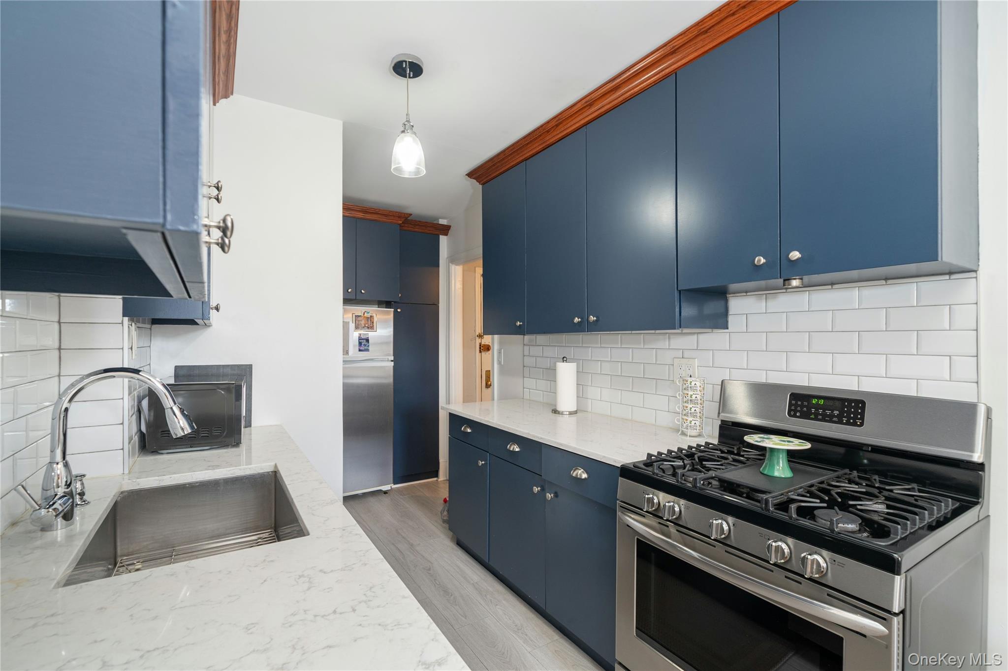 100 Parkway Road, Unit 4D Bronxville, NY 10708 - Photo 7 of 13 Stainless Steel Appliances and Quartz Counters