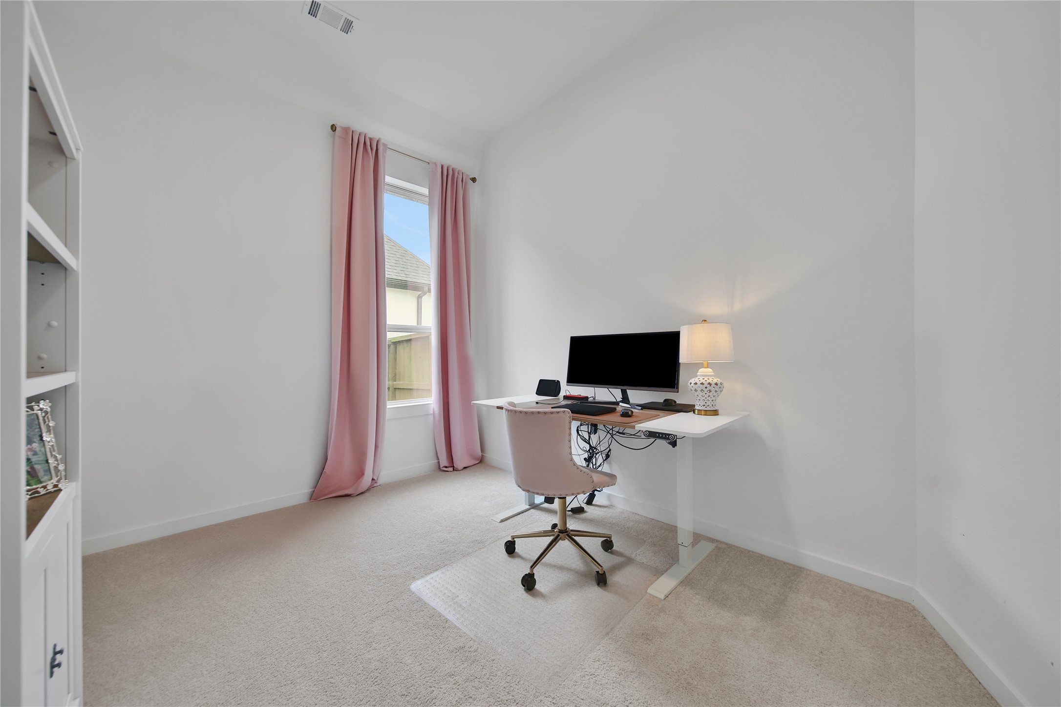 4103 Shackleton Court Rosharon, TX 77583 - Photo 17 of 32 Currently hosting a private office space this secondary bedroom offers a spacious closet