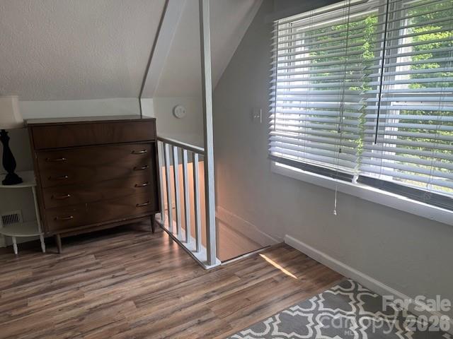 10 Chigger Ridge Road Sylva, NC 28779 - Photo 12 of 22 a view of empty room with wooden floor and fan