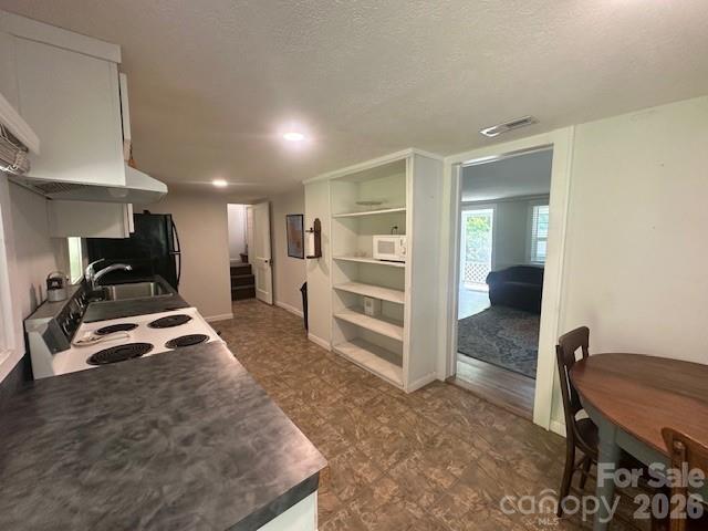 10 Chigger Ridge Road Sylva, NC 28779 - Photo 4 of 22 a view of a room with gym equipment