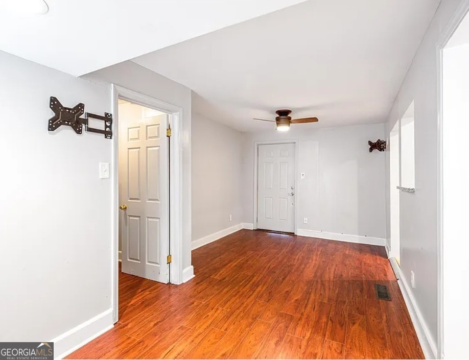1143 United Avenue Southeast, Unit B Atlanta, GA 30316 - Photo 16 of 17 wooden floor in an empty room with a window