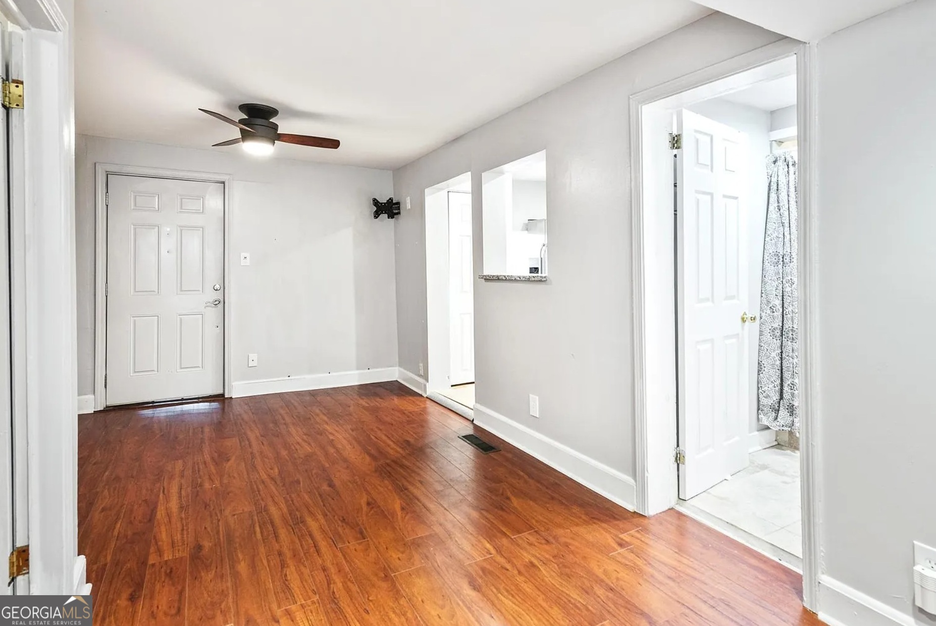 1143 United Avenue Southeast, Unit B Atlanta, GA 30316 - Photo 17 of 17 a view of an empty room with wooden floor