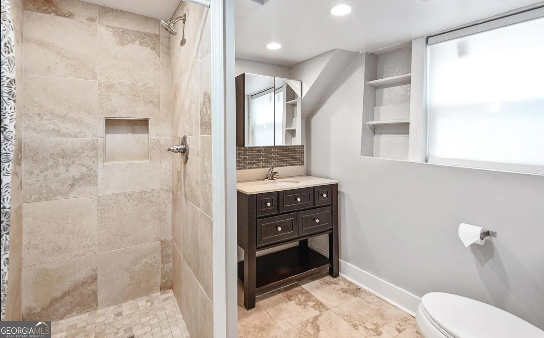 1143 United Avenue Southeast, Unit B Atlanta, GA 30316 - Photo 4 of 17 a bathroom with a sink and a mirror