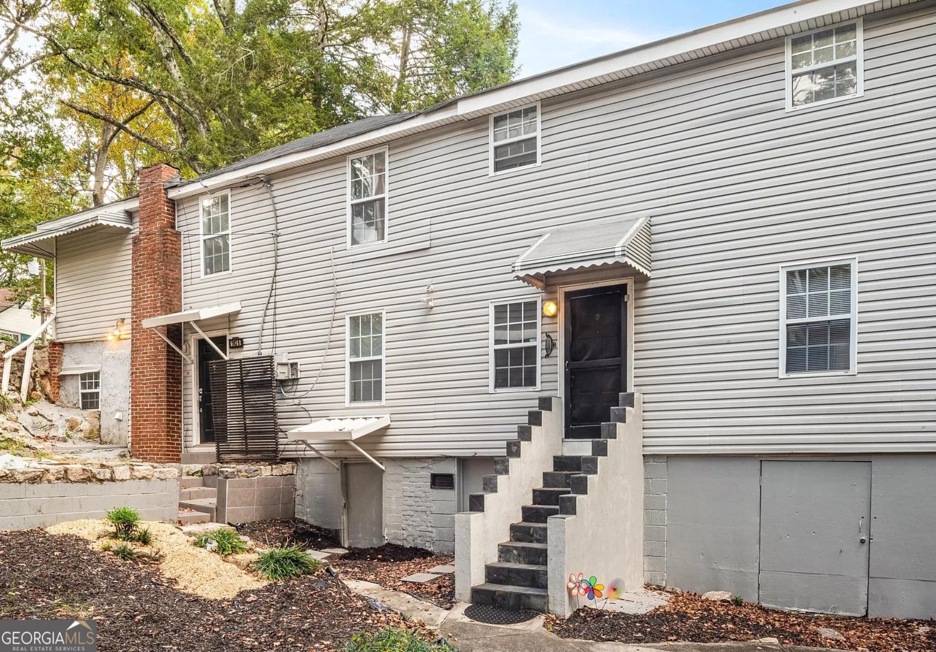 1143 United Avenue Southeast, Unit B Atlanta, GA 30316 - Photo 9 of 17 a view of a house with a yard