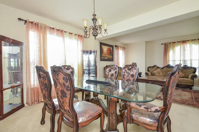 a view of a dining room with furniture