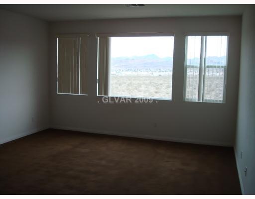 724 Blue Crystal Cree Road Henderson, NV 89002 - Photo 7 of 12 Master Bedroom.