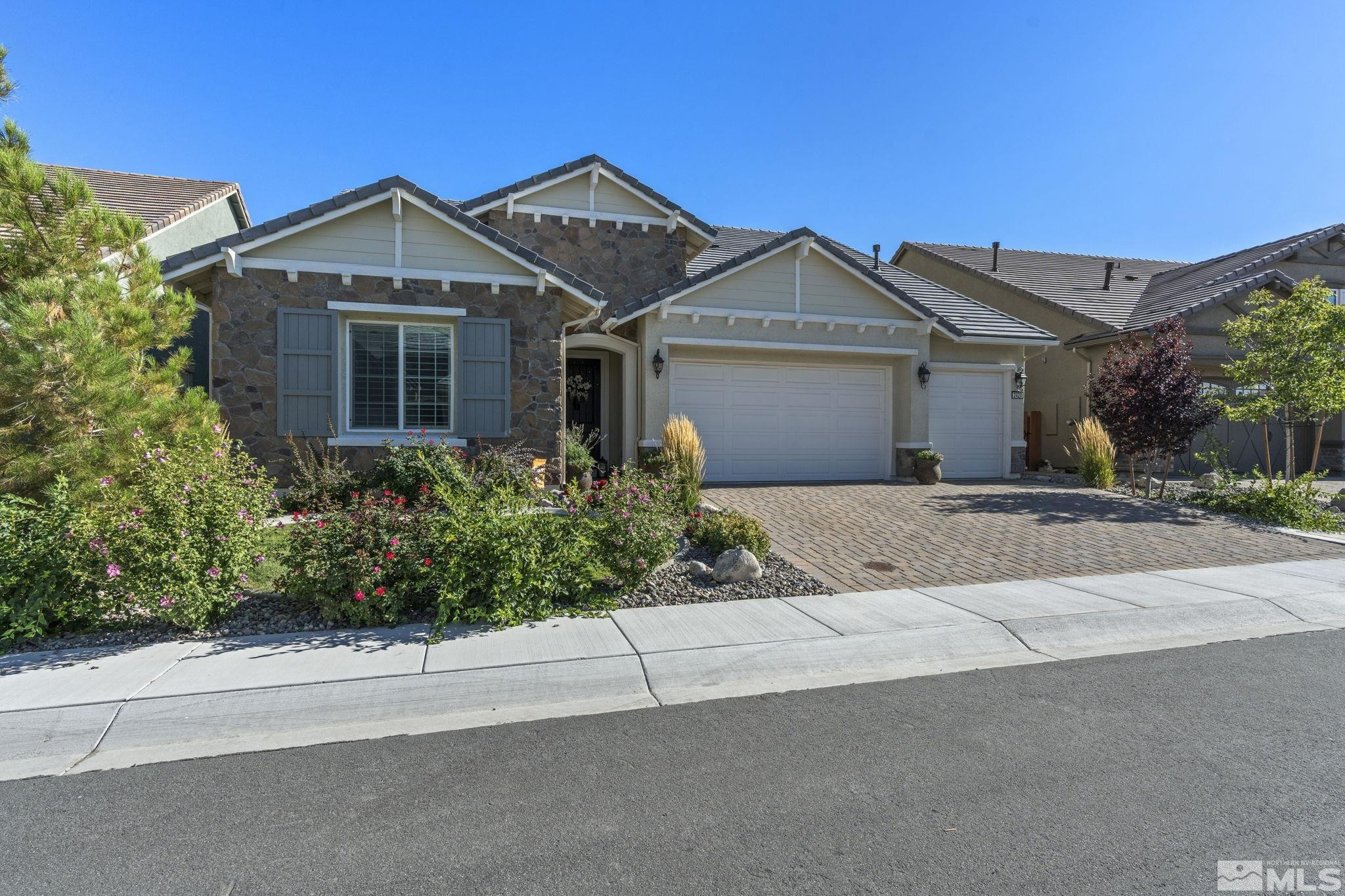 2420 Buttermere Court Reno, NV 89521 - Photo 2 of 40 front view of a house with a yard