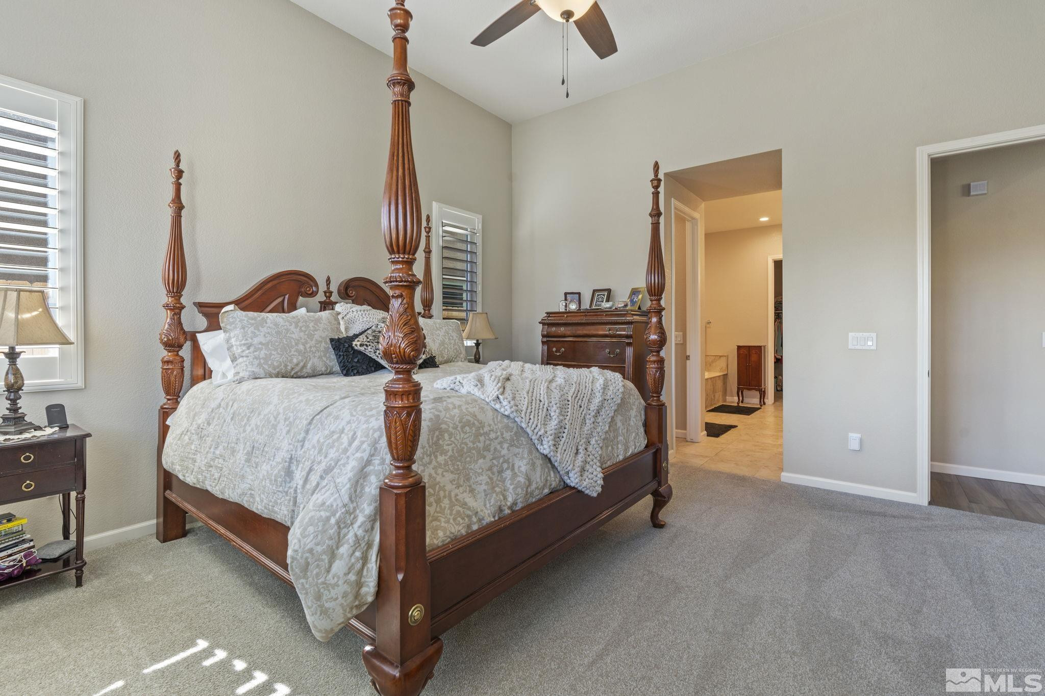 2420 Buttermere Court Reno, NV 89521 - Photo 22 of 40 a bed room with a bed and a night stand