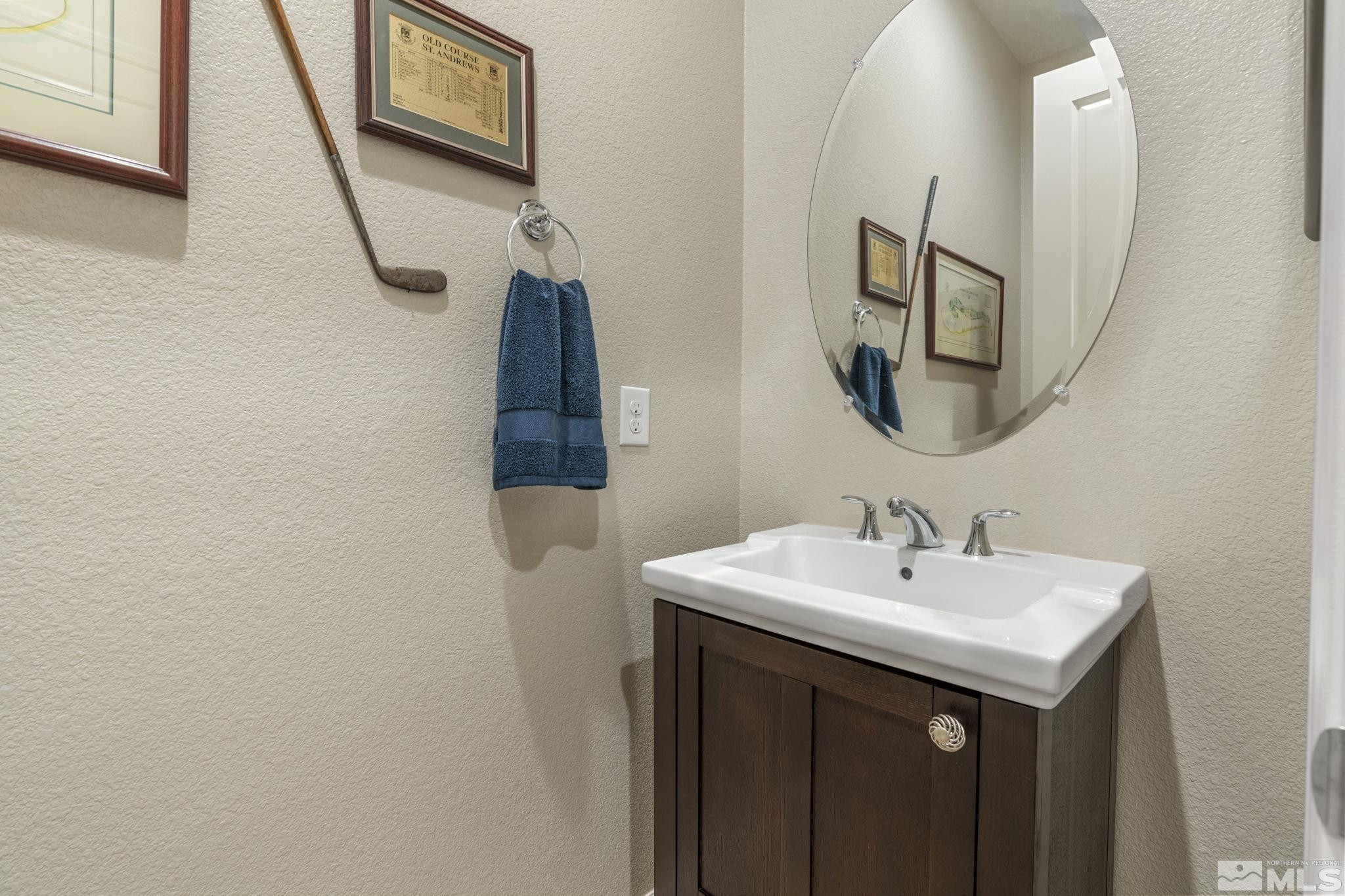 2420 Buttermere Court Reno, NV 89521 - Photo 30 of 40 a bathroom with a sink and mirror