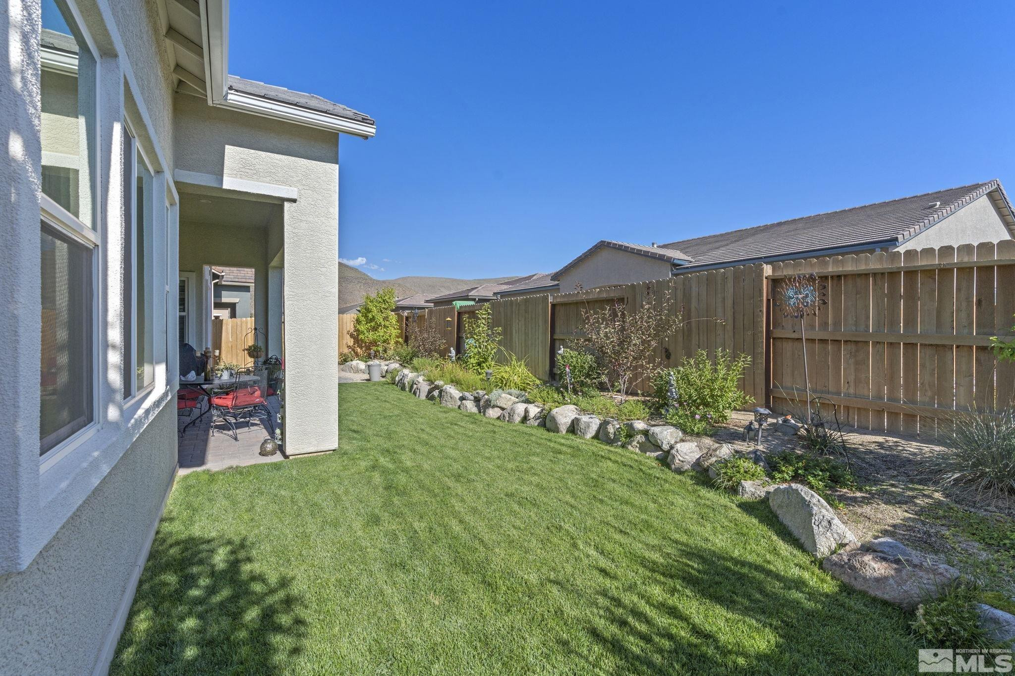 2420 Buttermere Court Reno, NV 89521 - Photo 34 of 40 a view of a backyard with garden