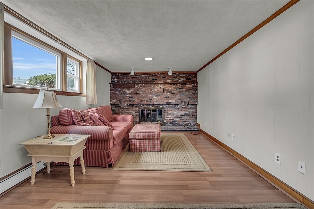 29 Meriam Road Concord, MA 01742 - Photo 18 of 24 a living room with furniture and a rug