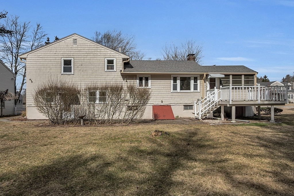 29 Meriam Road Concord, MA 01742 - Photo 3 of 24 a front view of a house with a yard