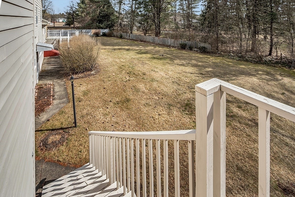 29 Meriam Road Concord, MA 01742 - Photo 4 of 24 a view of a yard with wooden fence