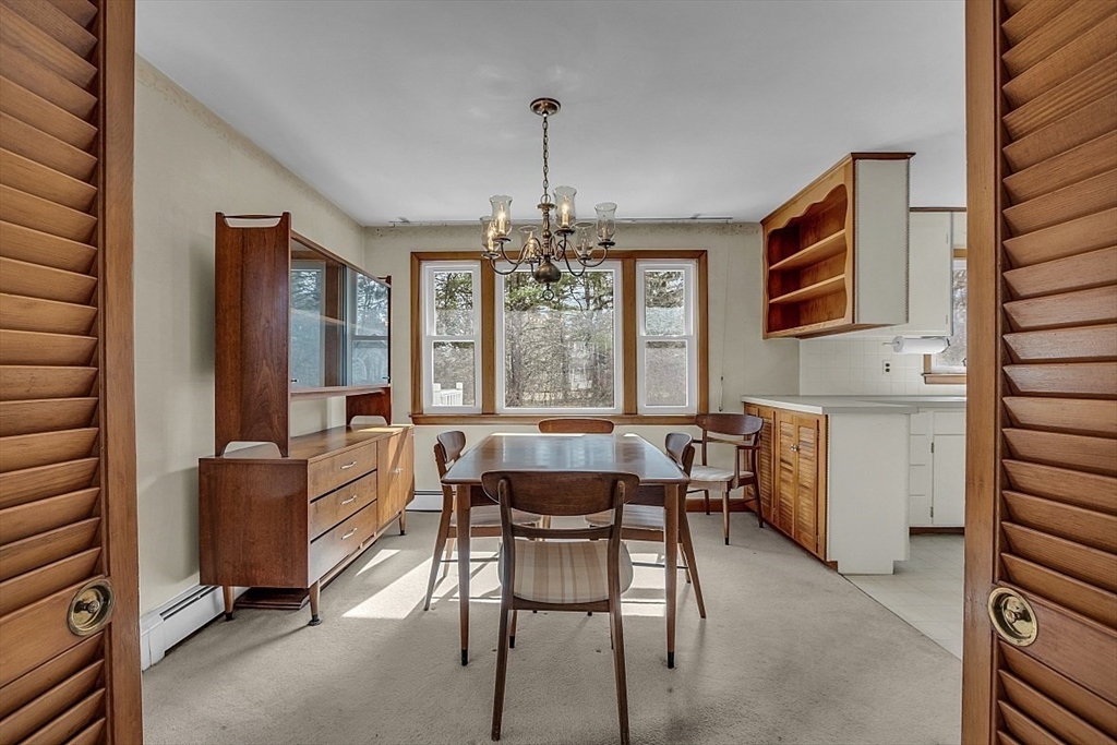 29 Meriam Road Concord, MA 01742 - Photo 9 of 24 a dining room with furniture and window