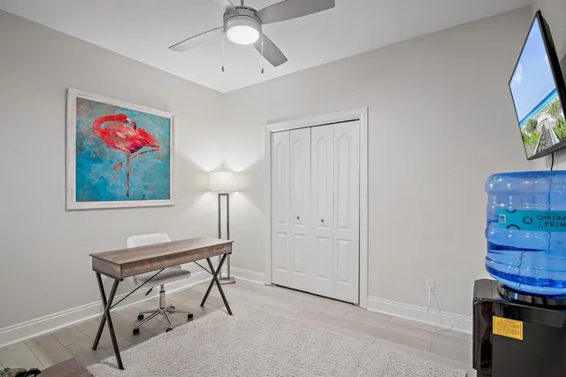 a workspace with furniture and wooden floor