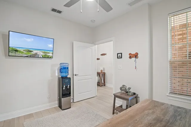 a living room with furniture and a window