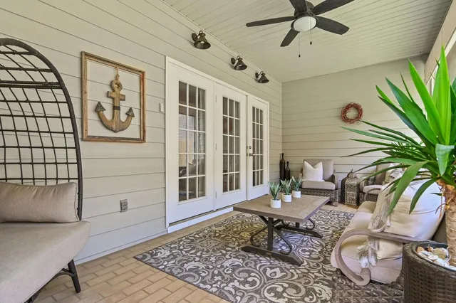 a living room with furniture and a window
