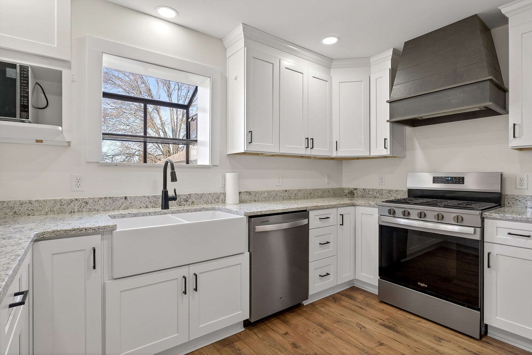 3857 Baxter Road Baxter, TN 38544 - Photo 13 of 52 a kitchen with appliances cabinets and a sink