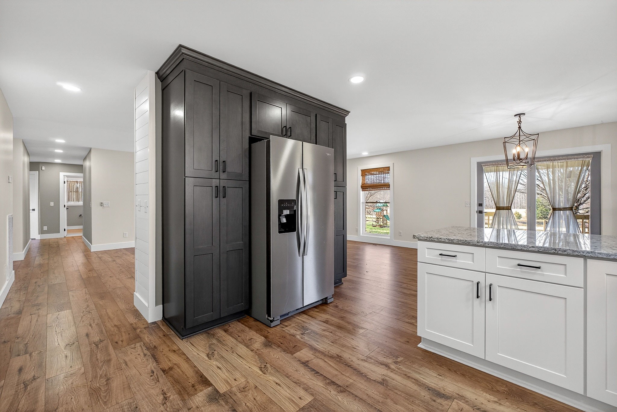 3857 Baxter Road Baxter, TN 38544 - Photo 15 of 52 a view of a refrigerator in kitchen and wooden floor
