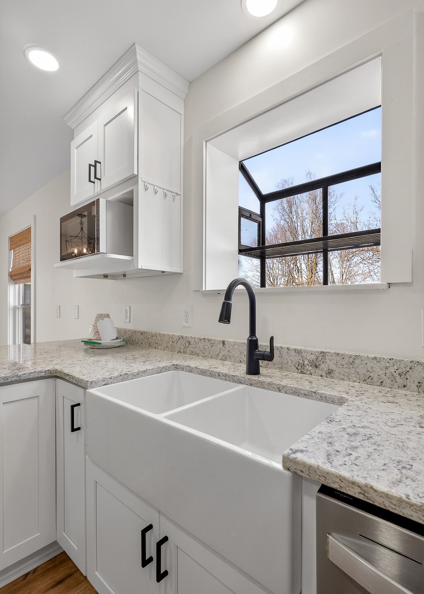 3857 Baxter Road Baxter, TN 38544 - Photo 16 of 52 a kitchen with a sink and cabinets