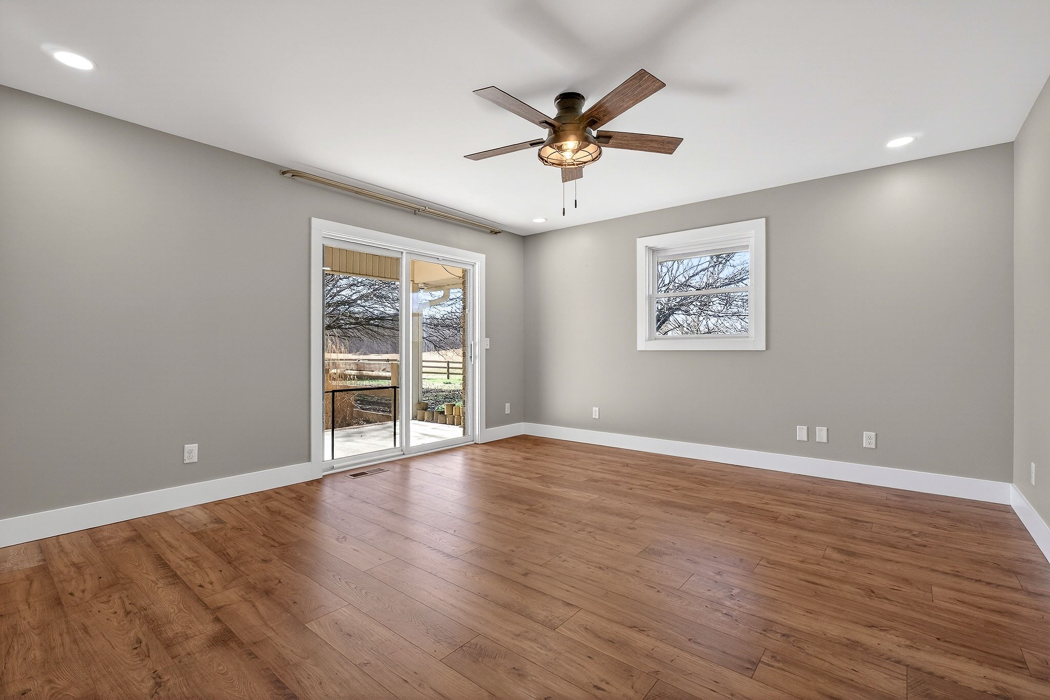 3857 Baxter Road Baxter, TN 38544 - Photo 26 of 52 a view of a big room with wooden floor and windows