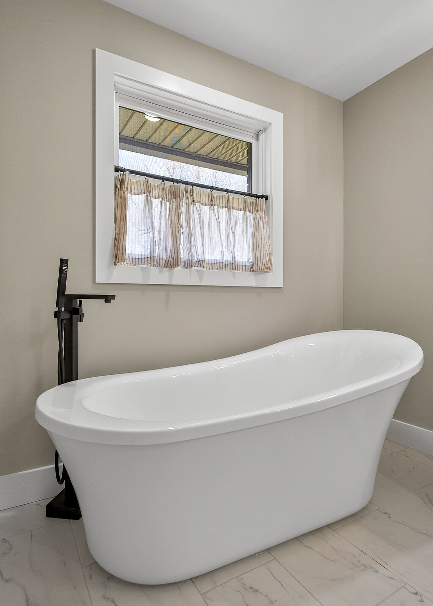 3857 Baxter Road Baxter, TN 38544 - Photo 32 of 52 a white bath tub sitting in a bathroom