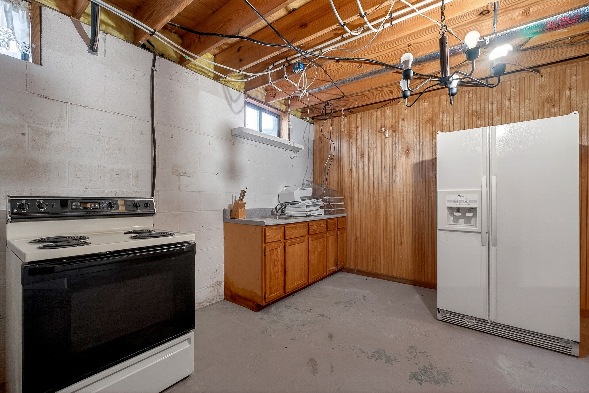 3857 Baxter Road Baxter, TN 38544 - Photo 36 of 52 a kitchen with a stove and a refrigerator