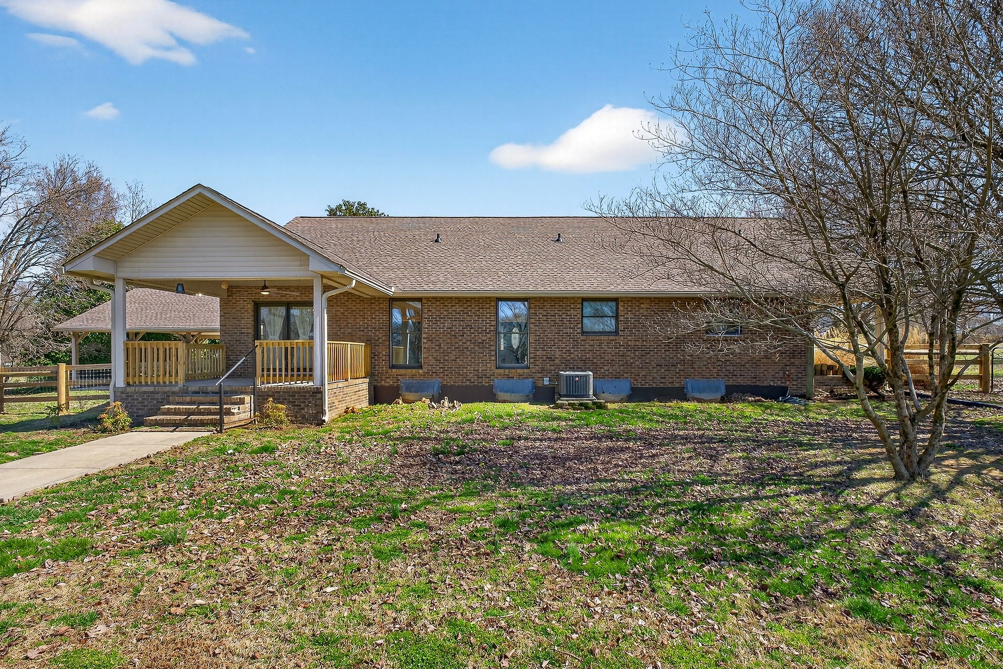 3857 Baxter Road Baxter, TN 38544 - Photo 48 of 52 a backyard of a house with table and chairs